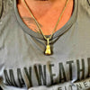 fighter wearing his gold boxing glove necklace - King Killers Apparel