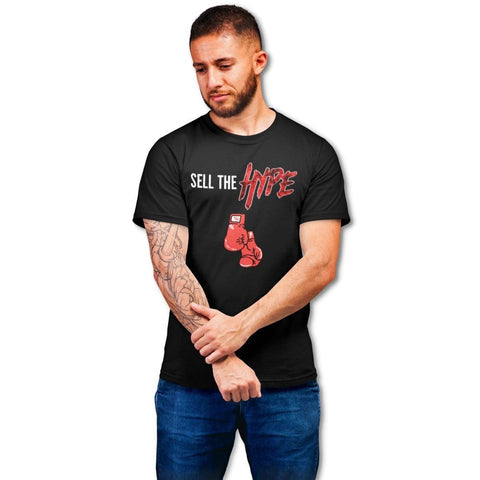 man wearing black graphic t shirt with the words Sell The HYPE Across The Chest With Red Boxing Gloves Icon - King Killers Apparel